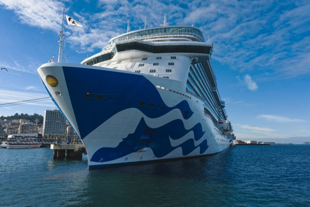 A large cruise ship docked in a harbor
