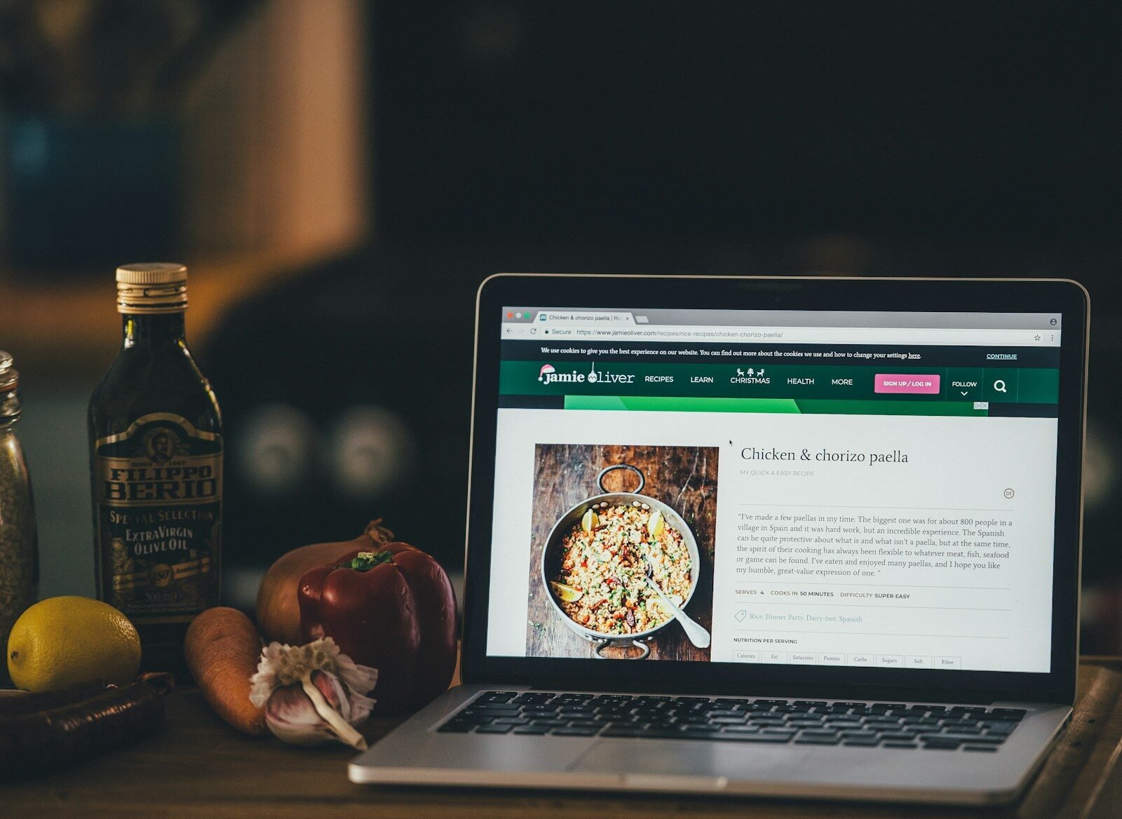 turned-on MacBook Pro on table